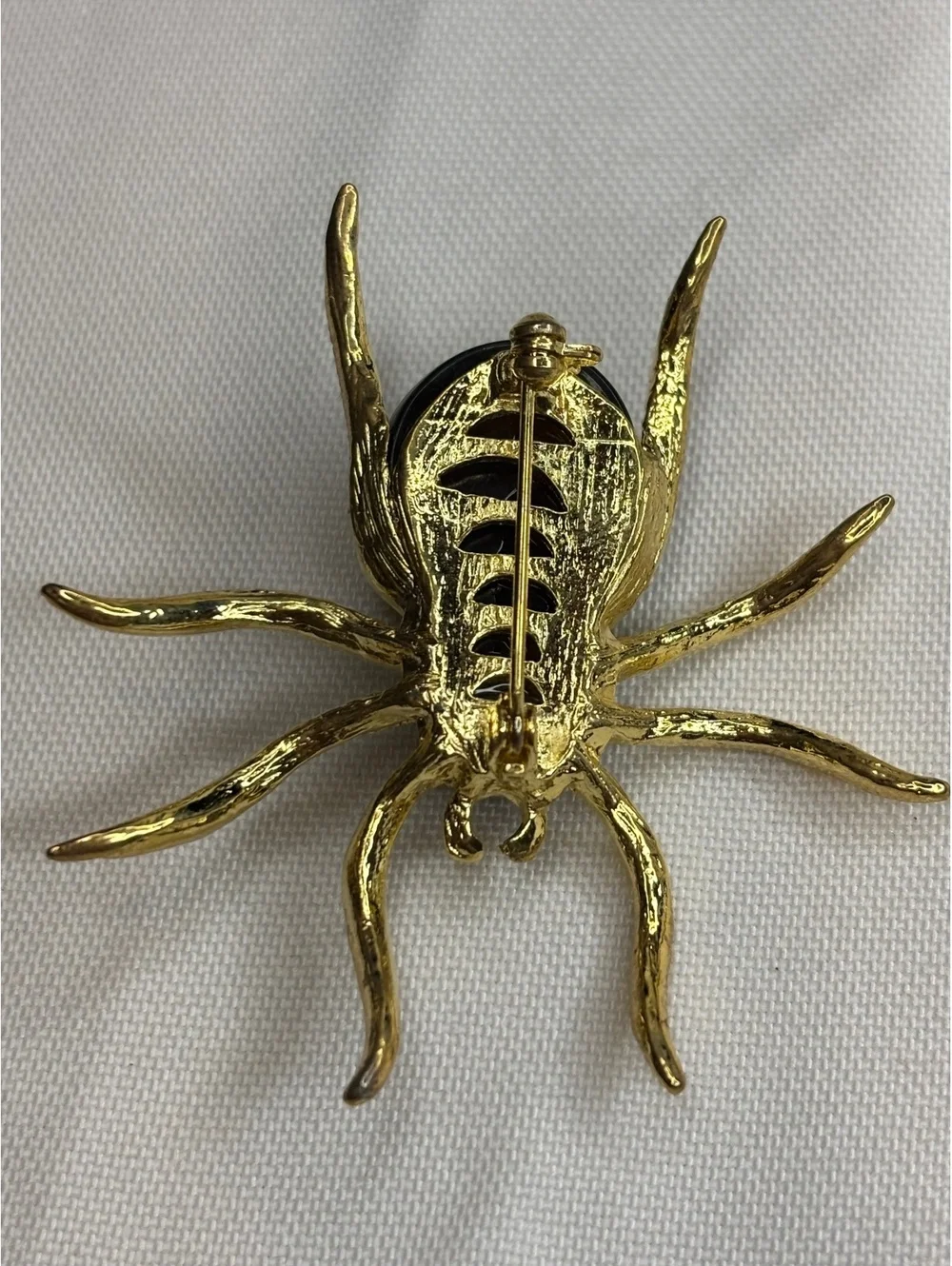 Vintage Lucite Spider Brooch with Gold Tone Legs and Rhinestone Eyes